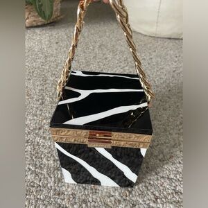 Zebra top handle bag.